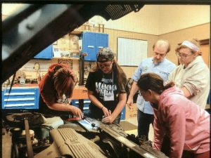 Female students explore auto mechanics at nontraditional summer camp